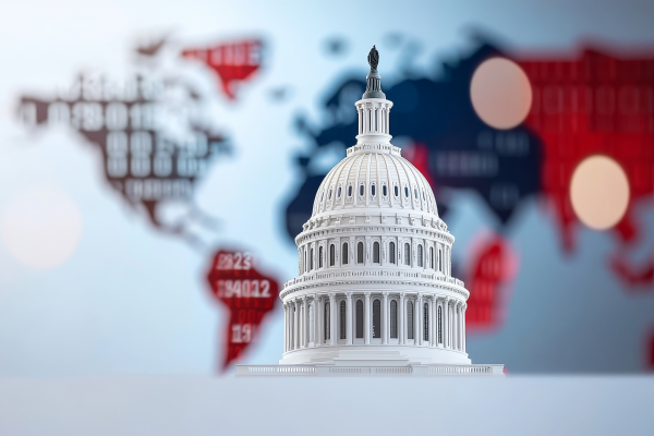 Figurine of US capital with world map in background